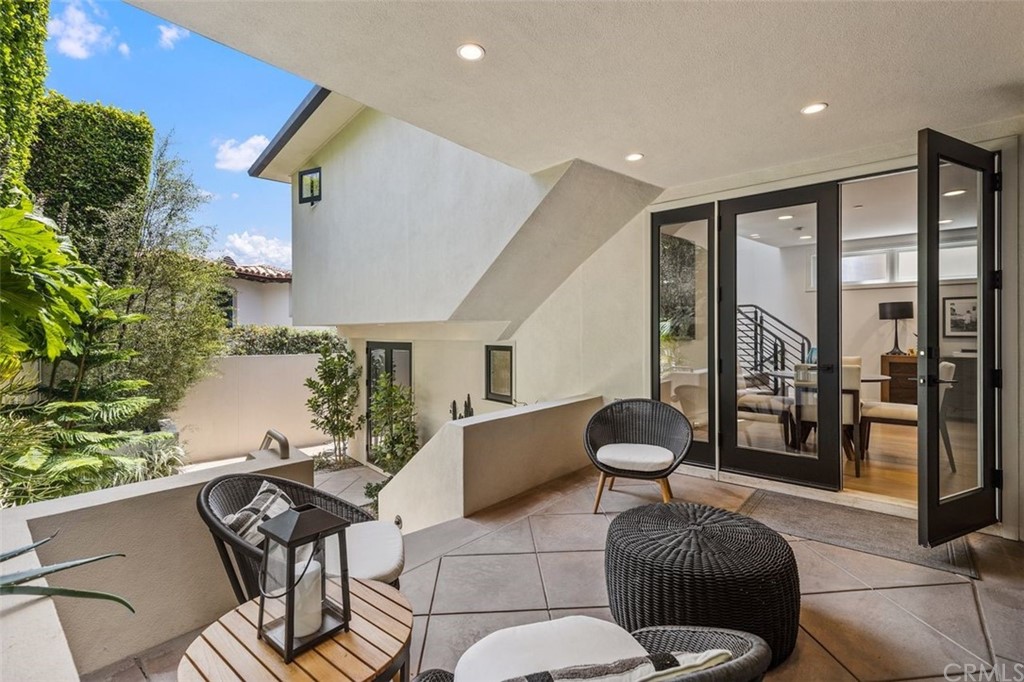 846 Emerald Bay Laguna Beach, CA 92651 - Photo 35 of 42 a living room with furniture and a large window