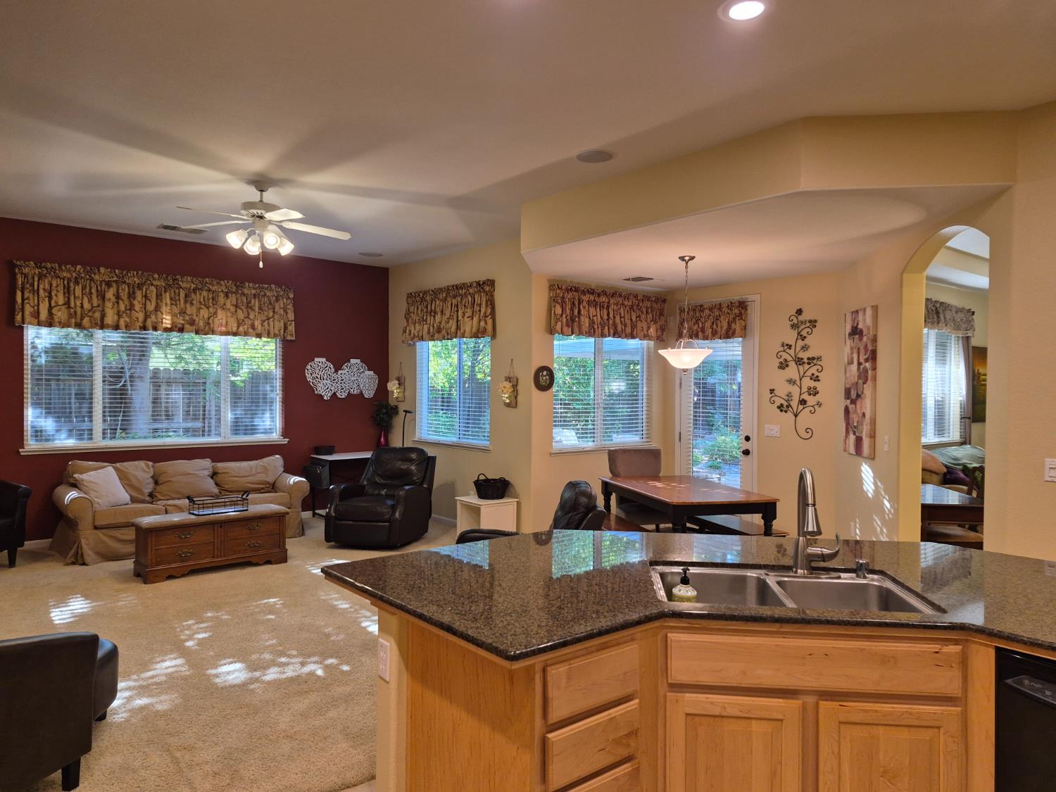 1845 Indiana Street Gridley, CA 95948 - Photo 7 of 12 a kitchen with stainless steel appliances granite countertop a sink and a stove