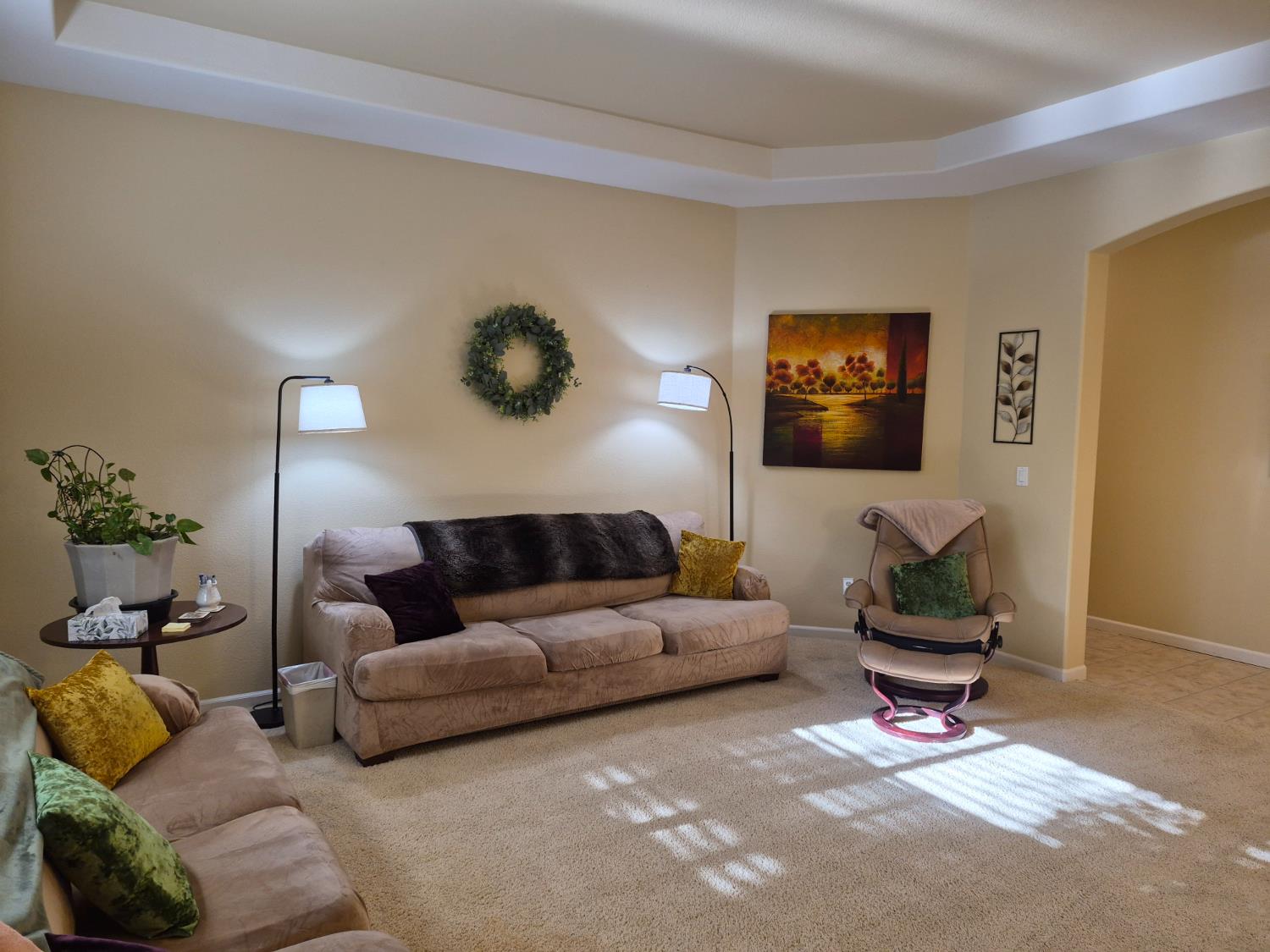 1845 Indiana Street Gridley, CA 95948 - Photo 8 of 12 a living room with furniture and a potted plant
