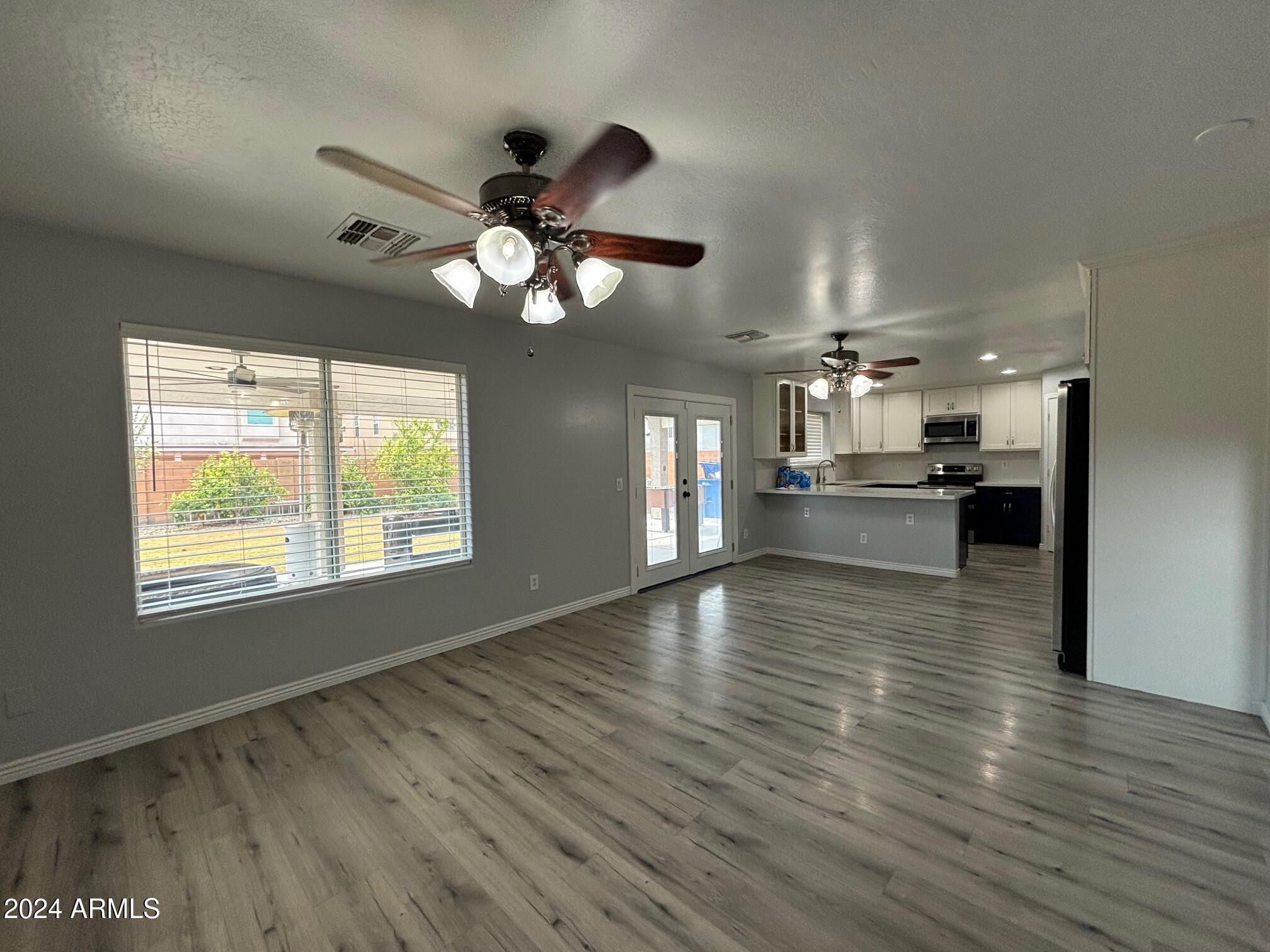 9205 West Cordes Road Tolleson, AZ 85353 - Photo 7 of 30 Living Room/Kitchen