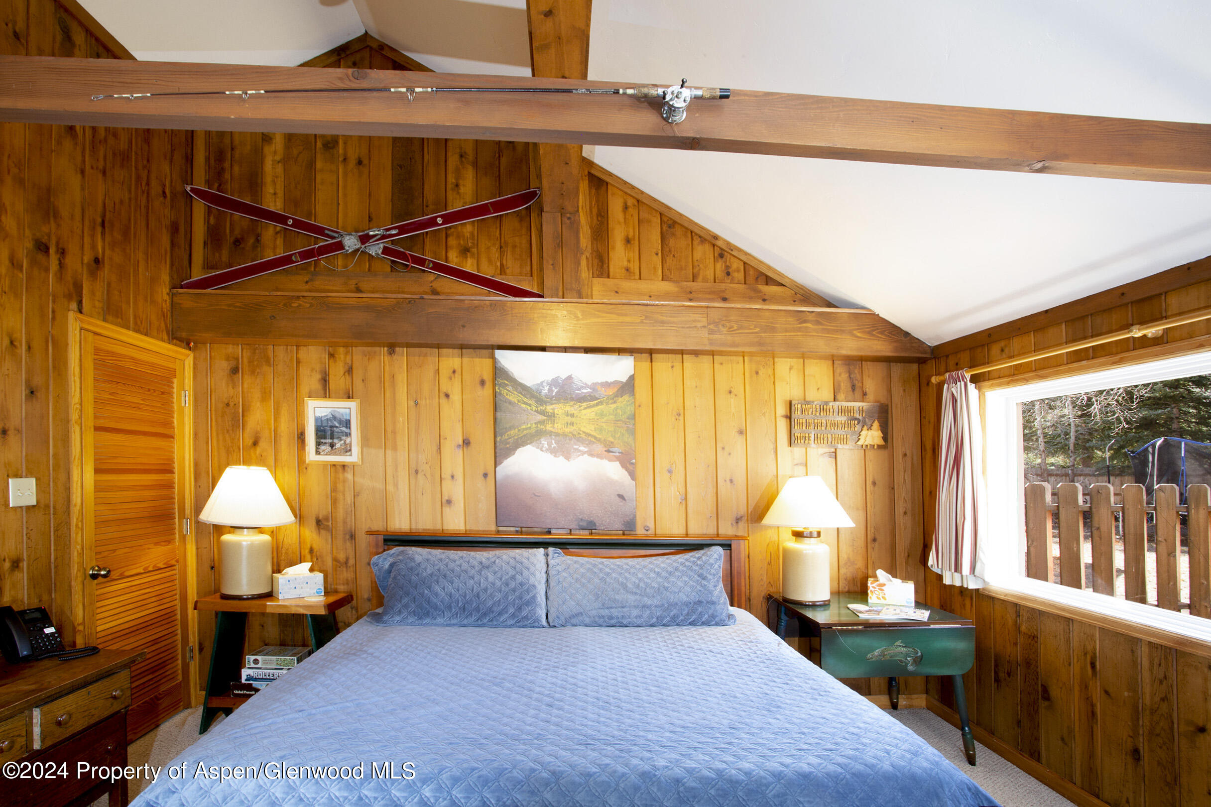 385 Redstone Boulevard Redstone, CO 81623 - Photo 12 of 20 a bedroom with furniture and large windows