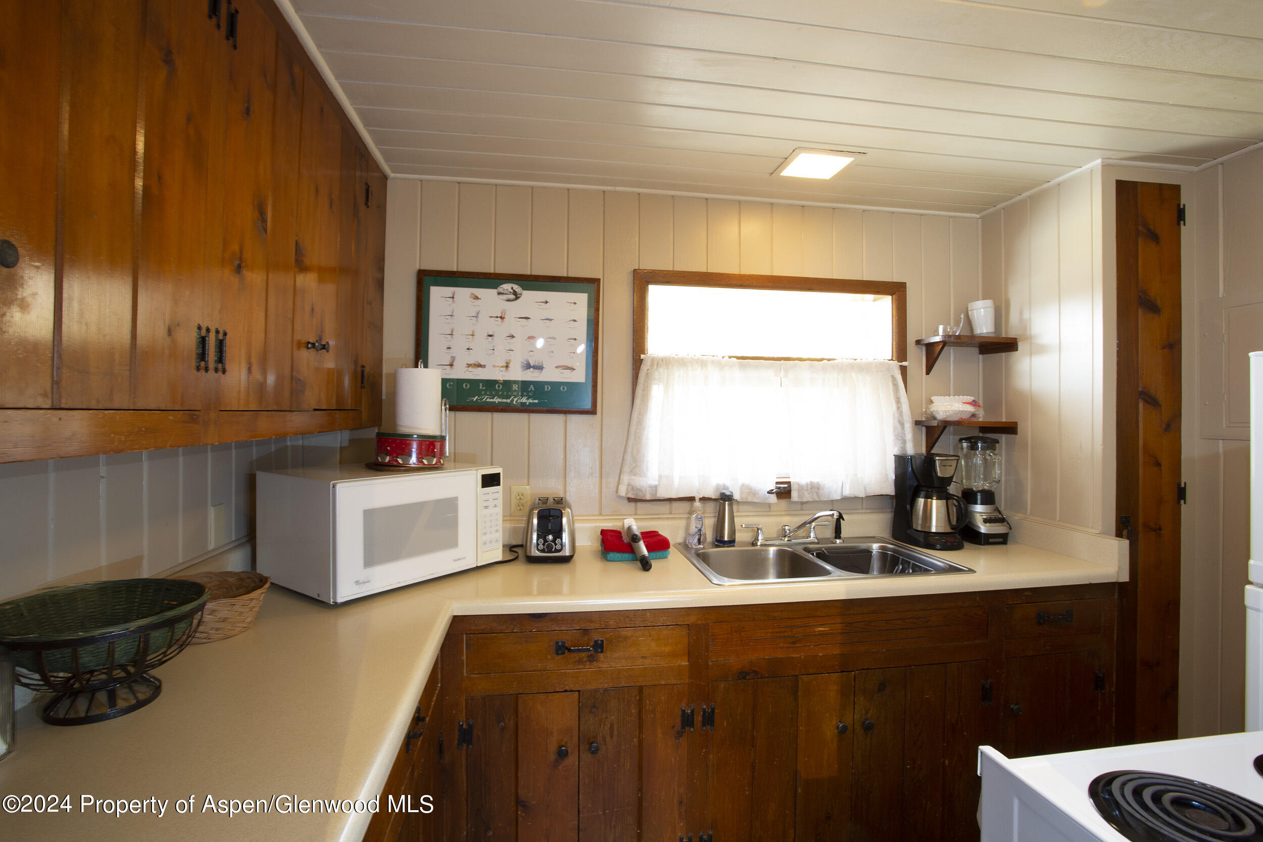 385 Redstone Boulevard Redstone, CO 81623 - Photo 14 of 20 a bathroom with a sink double vanity and a mirror