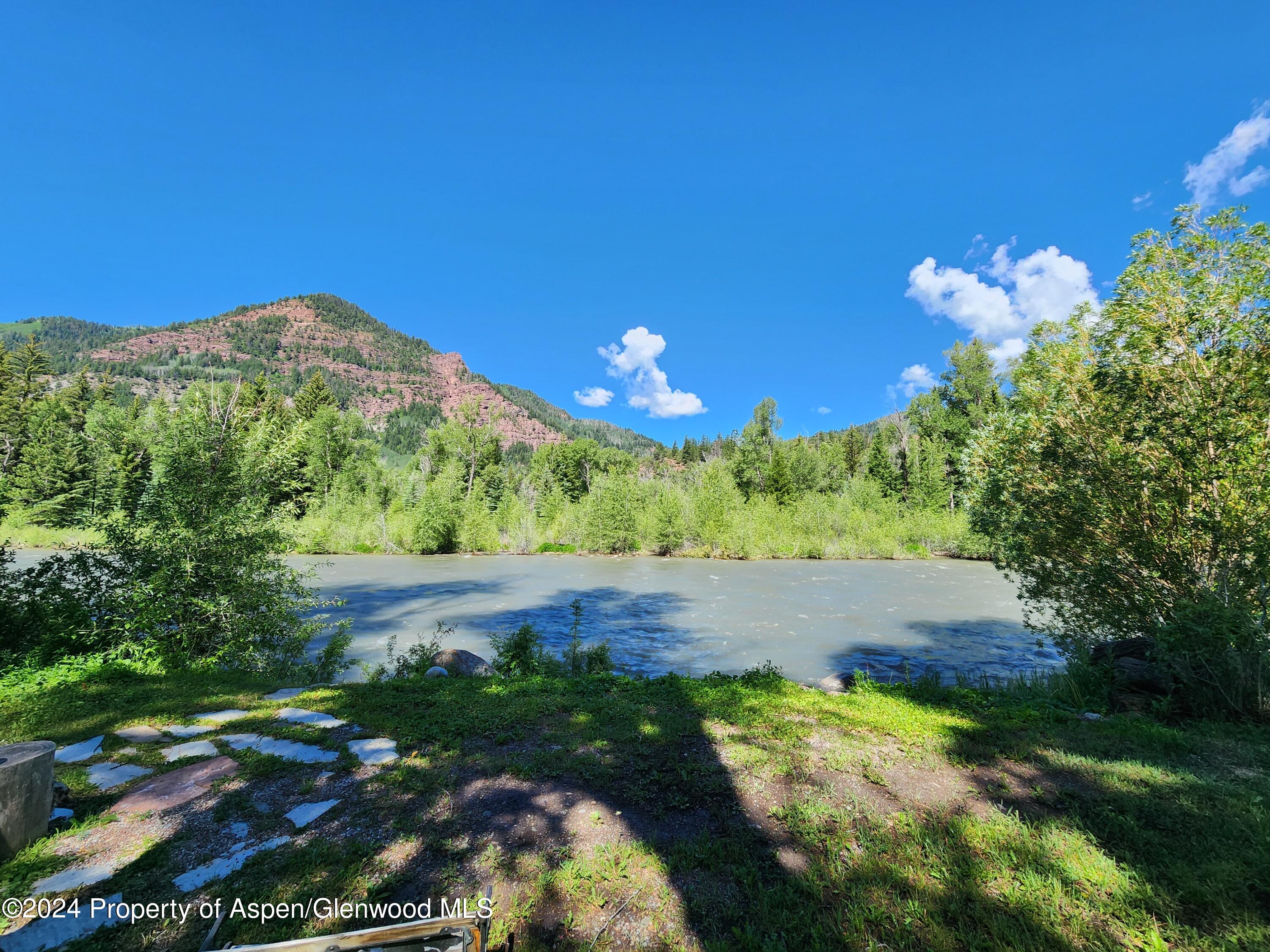 385 Redstone Boulevard Redstone, CO 81623 - Photo 5 of 20 a view of a yard with an tree