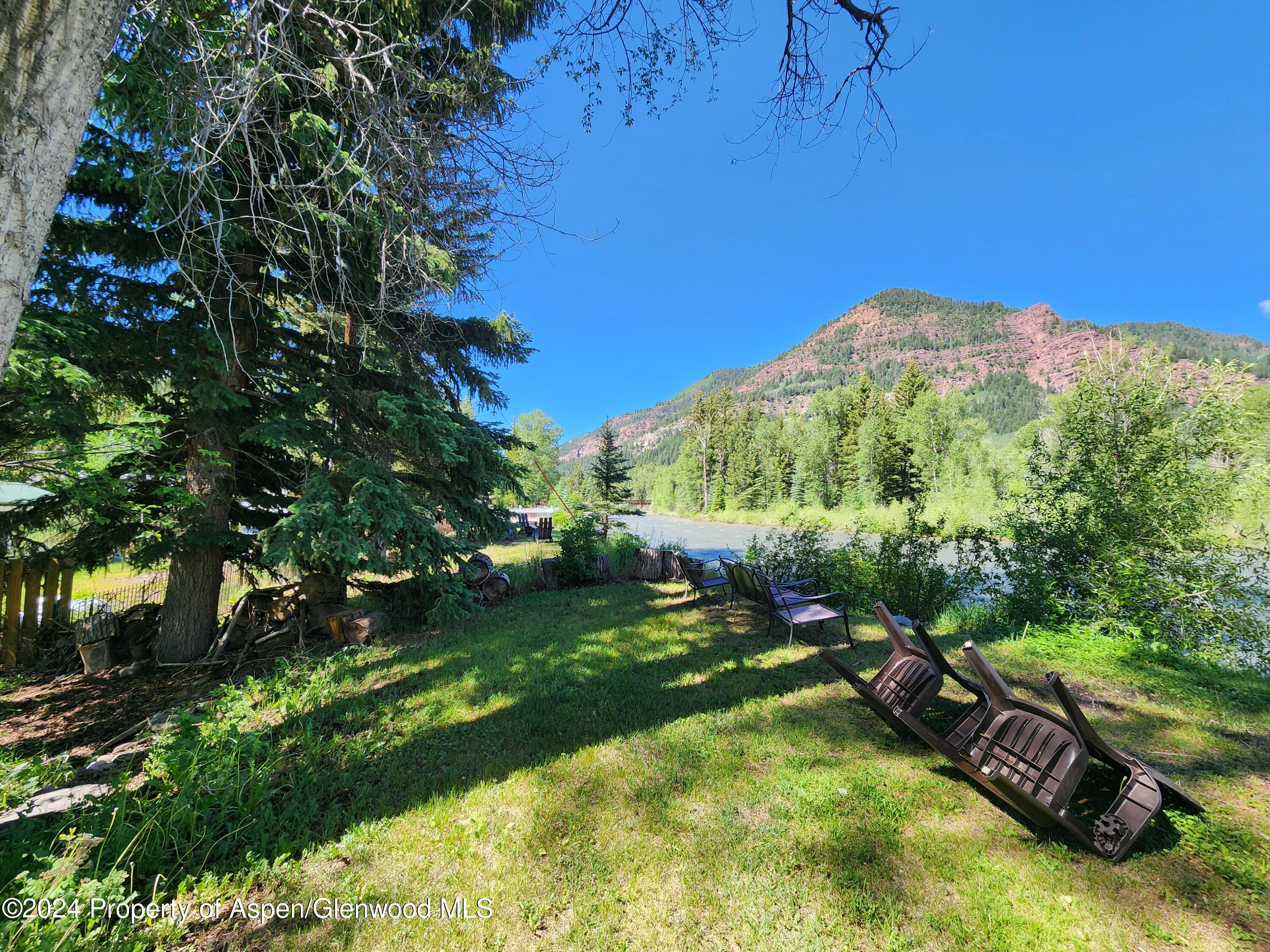 385 Redstone Boulevard Redstone, CO 81623 - Photo 6 of 20 a view of an outdoor space and a yard