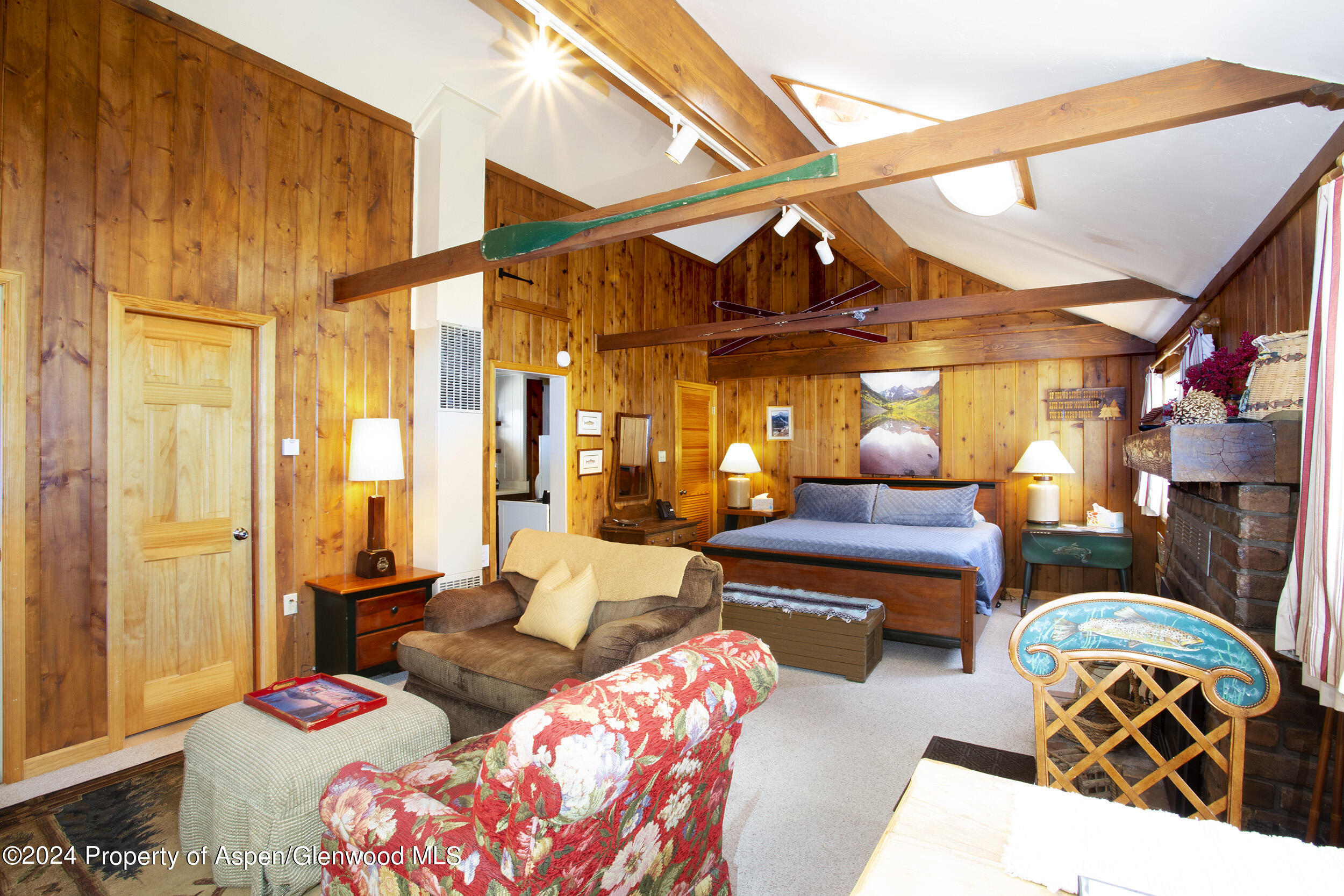 385 Redstone Boulevard Redstone, CO 81623 - Photo 10 of 20 a living room with furniture a couch and large window
