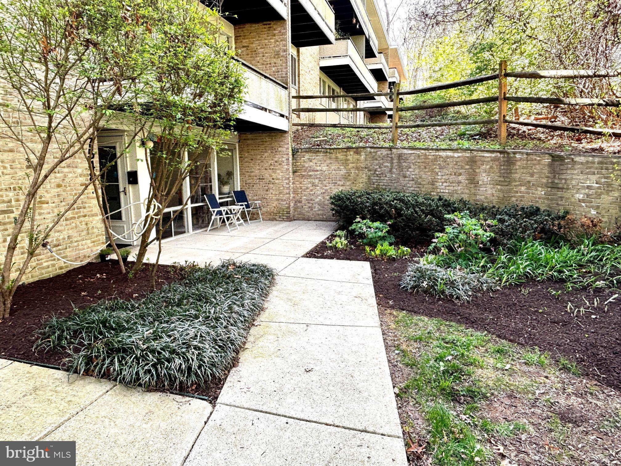 7548 Spring Lake Drive, Unit A Bethesda, MD 20817 - Photo 1 of 23 a view of a back yard of the house