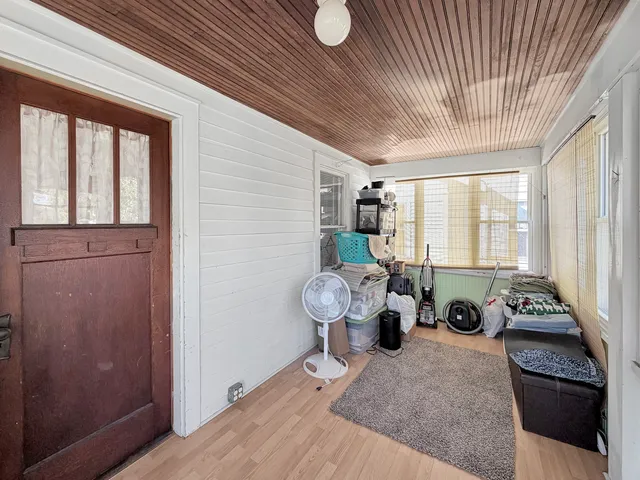 a room with furniture and window