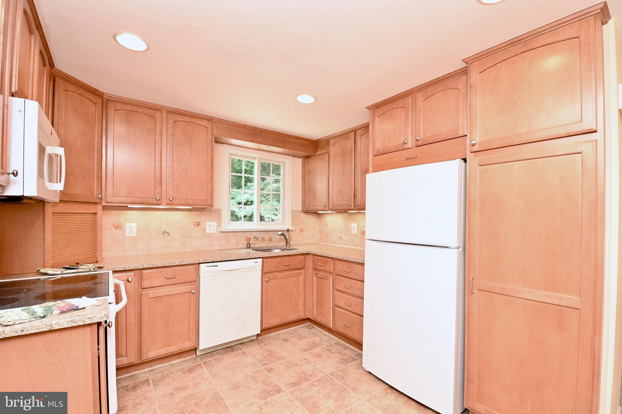 8113 Winter Blue Court Springfield, VA 22153 - Photo 13 of 58 42" light maple cabinets