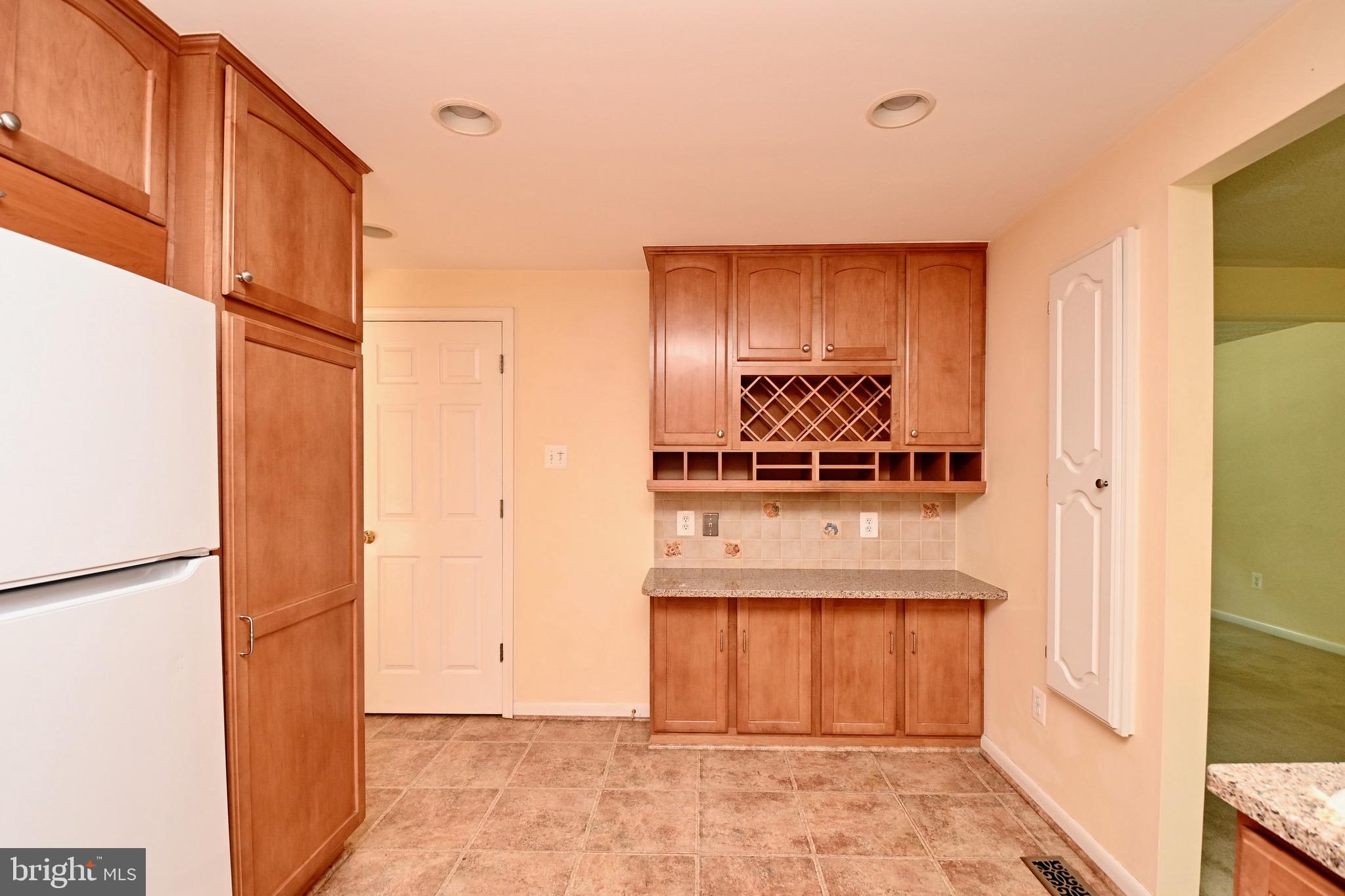 8113 Winter Blue Court Springfield, VA 22153 - Photo 14 of 58 storage and wine or bottle rack