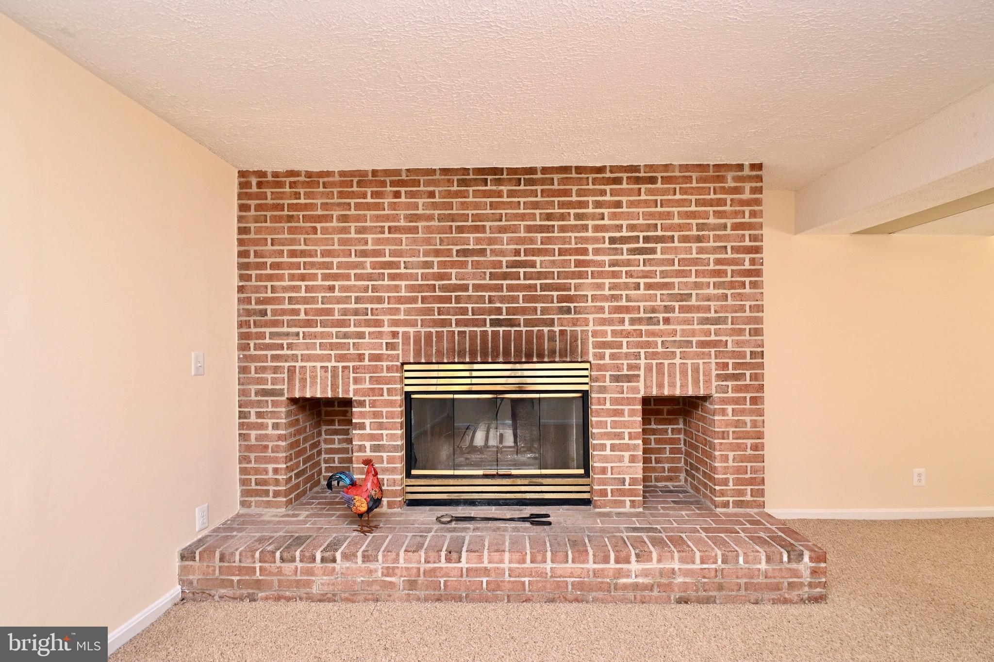 8113 Winter Blue Court Springfield, VA 22153 - Photo 40 of 58 Custom brick fireplace with 2 log niches