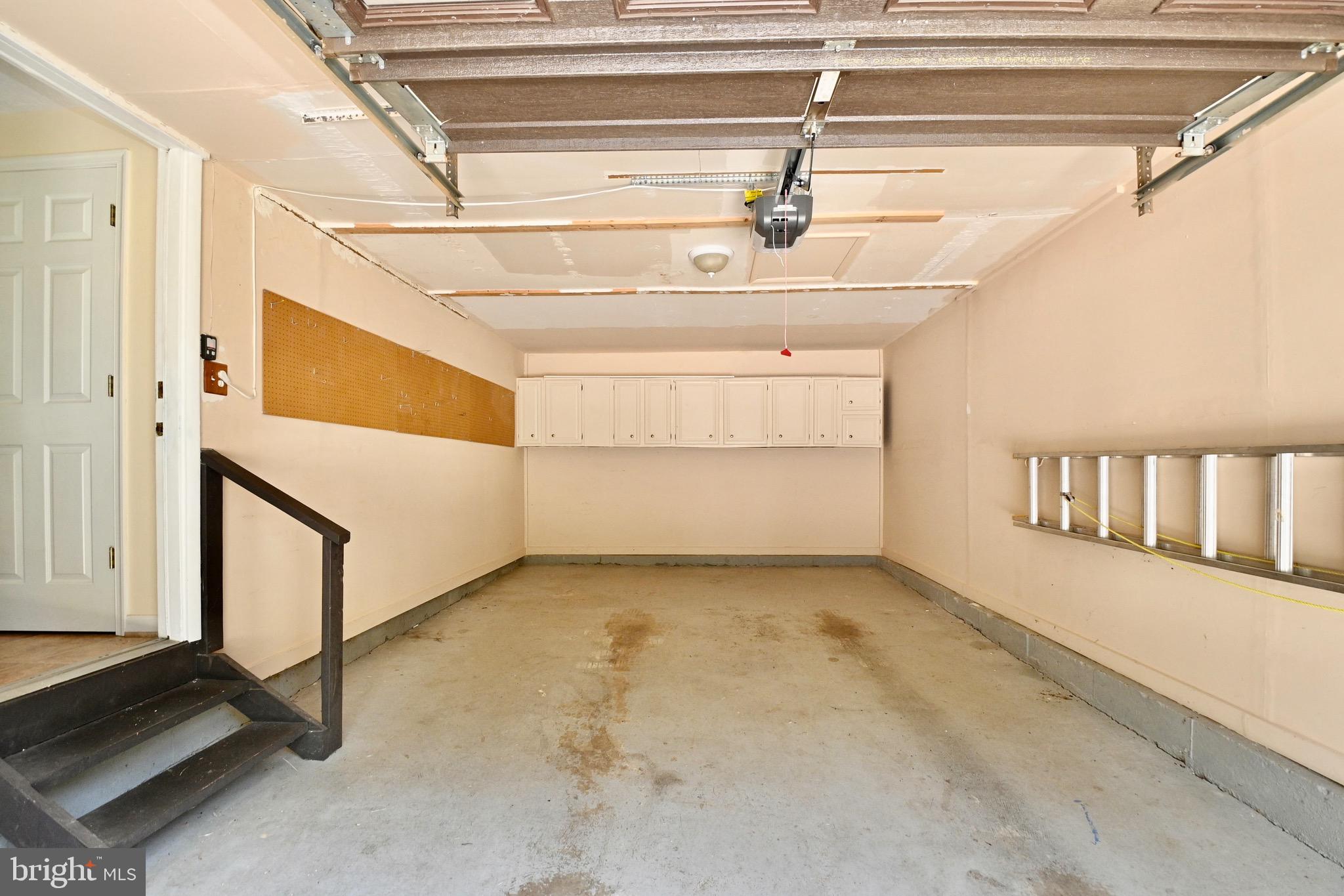 8113 Winter Blue Court Springfield, VA 22153 - Photo 47 of 58 Oversized garage with access to home and storage c