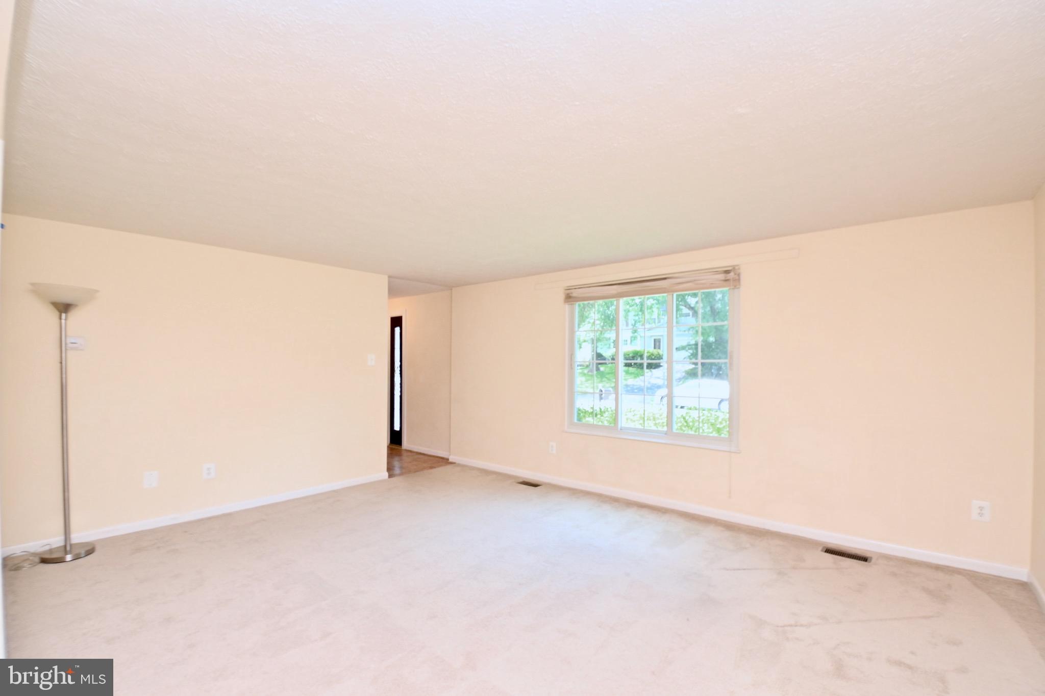 8113 Winter Blue Court Springfield, VA 22153 - Photo 10 of 58 Window view of living room with pleated shades