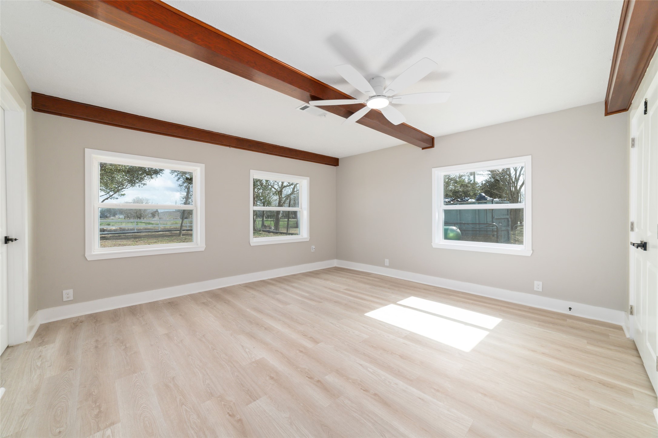 13431 Vrlla Road Guy, TX 77444 - Photo 20 of 32 a view of empty room with windows