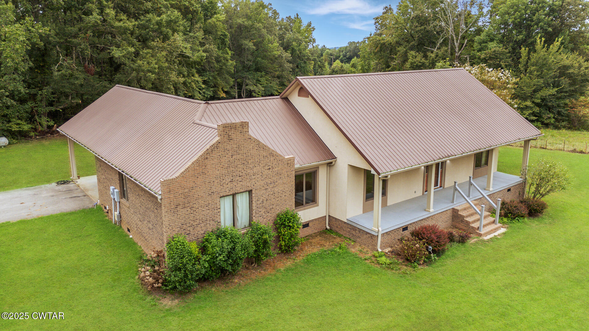 3554 Shades Bridge Road Greenfield, TN 38230 - Photo 1 of 49 an aerial view of a house