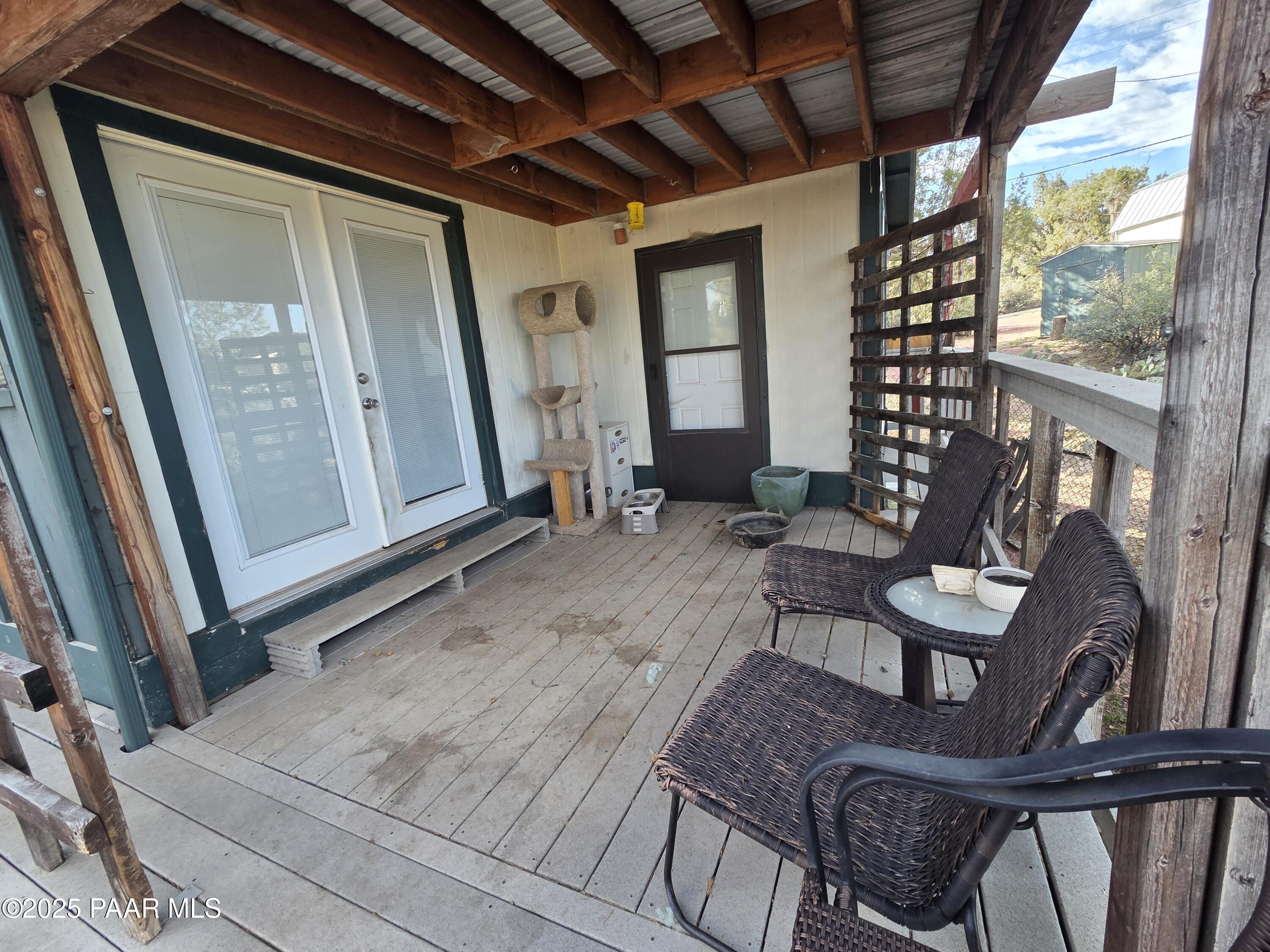 7250 West Hootenanny Road Prescott, AZ 86305 - Photo 12 of 30 a living room with furniture and a window