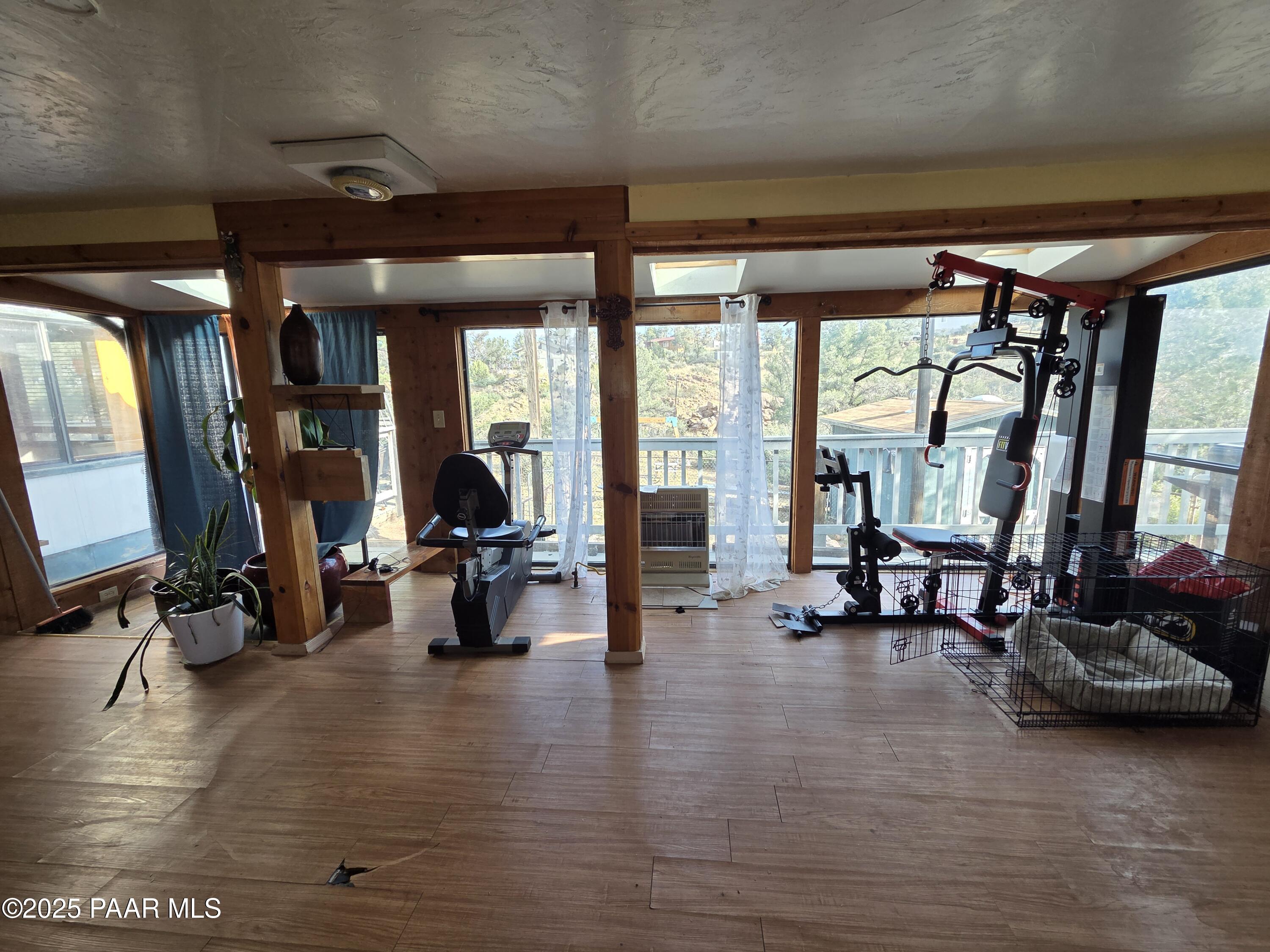 7250 West Hootenanny Road Prescott, AZ 86305 - Photo 18 of 30 a view of a room with gym equipment