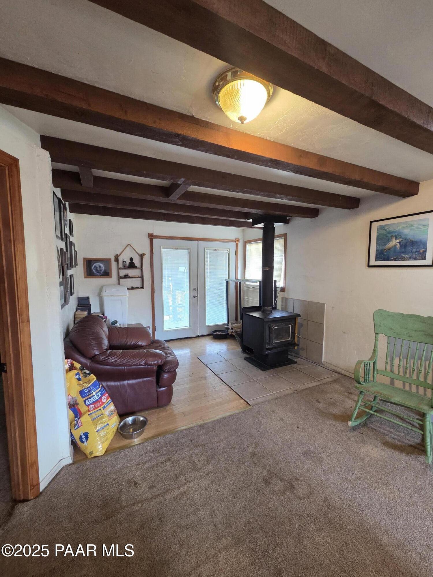 7250 West Hootenanny Road Prescott, AZ 86305 - Photo 21 of 30 a living room with furniture and a wooden floor