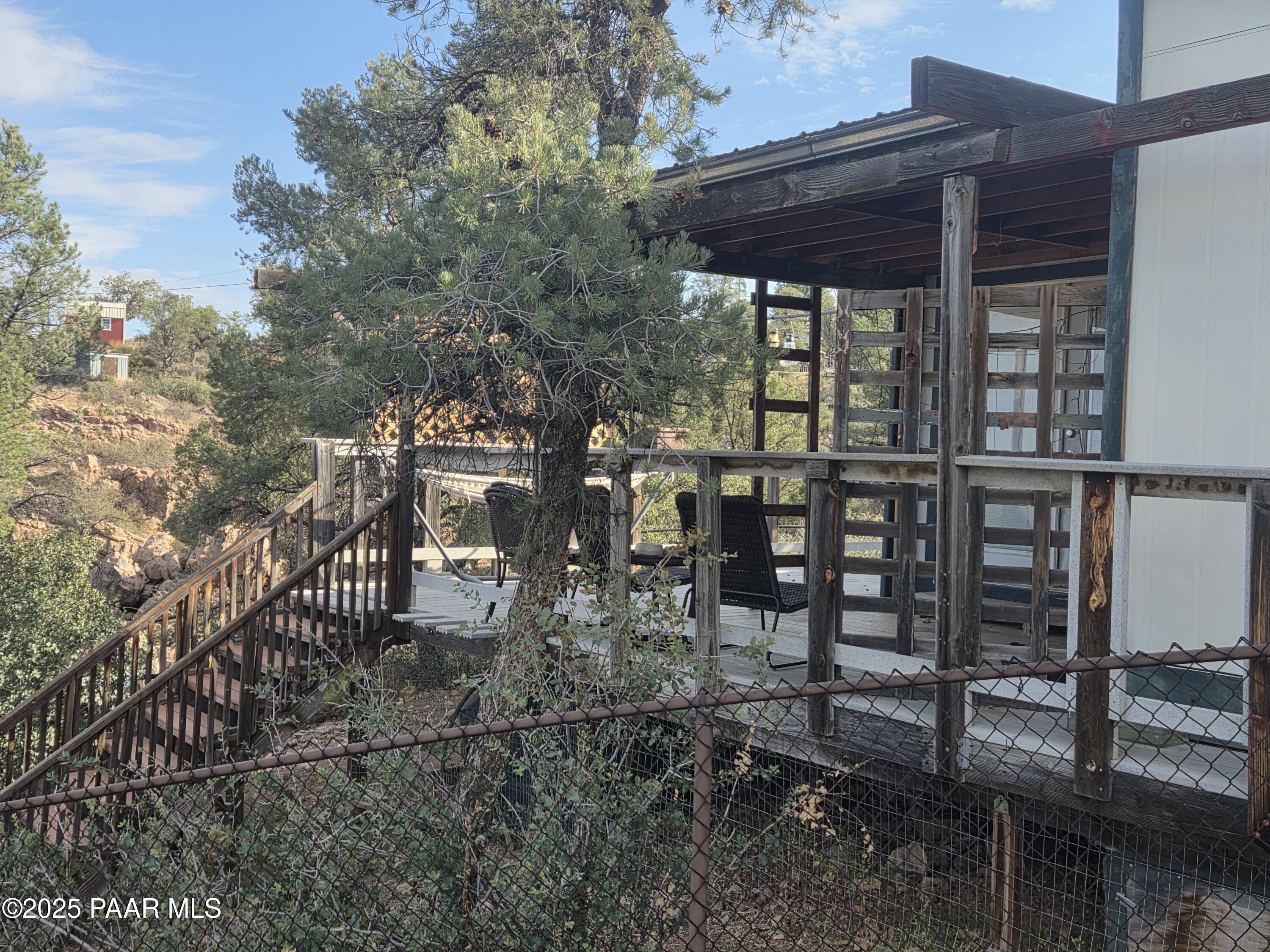 7250 West Hootenanny Road Prescott, AZ 86305 - Photo 7 of 30 a view of a backyard with sitting area