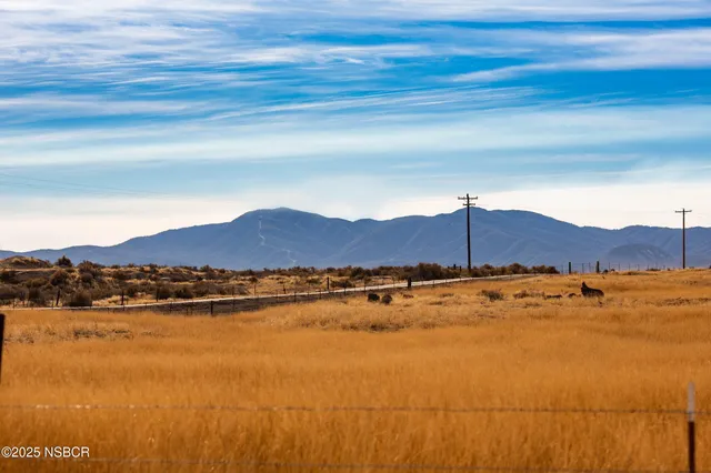 a view of an ocean and a mountain