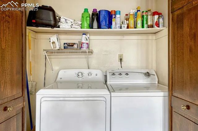 a utility room with dryer and washer