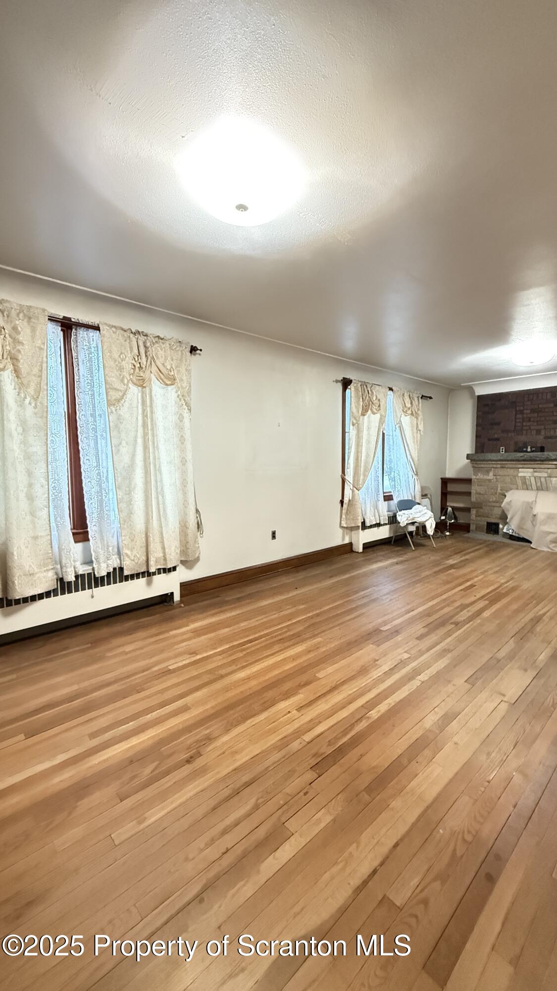 220 Hickory Ridge Road Carbondale, PA 18407 - Photo 13 of 51 a view of a room with wooden floor
