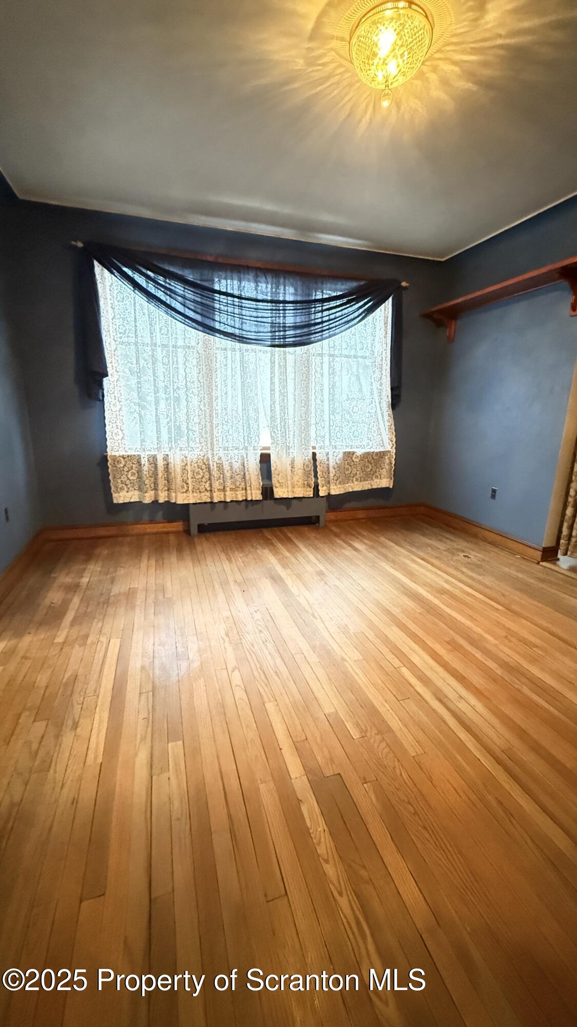 220 Hickory Ridge Road Carbondale, PA 18407 - Photo 14 of 51 a view of a room with wooden floor and window