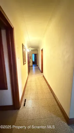 a view of hallway with stairs