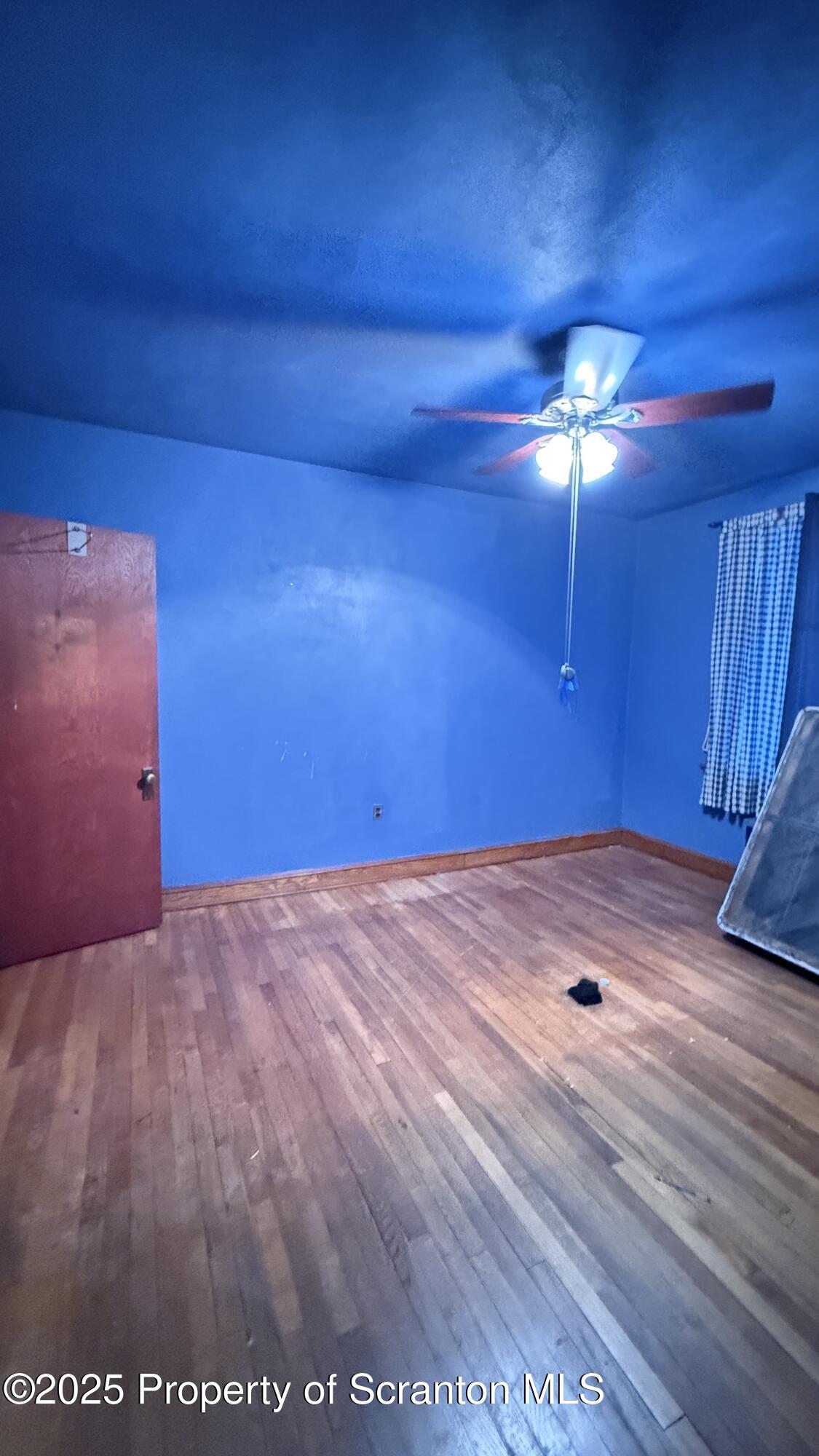 220 Hickory Ridge Road Carbondale, PA 18407 - Photo 23 of 51 a view of a room with a hanging light