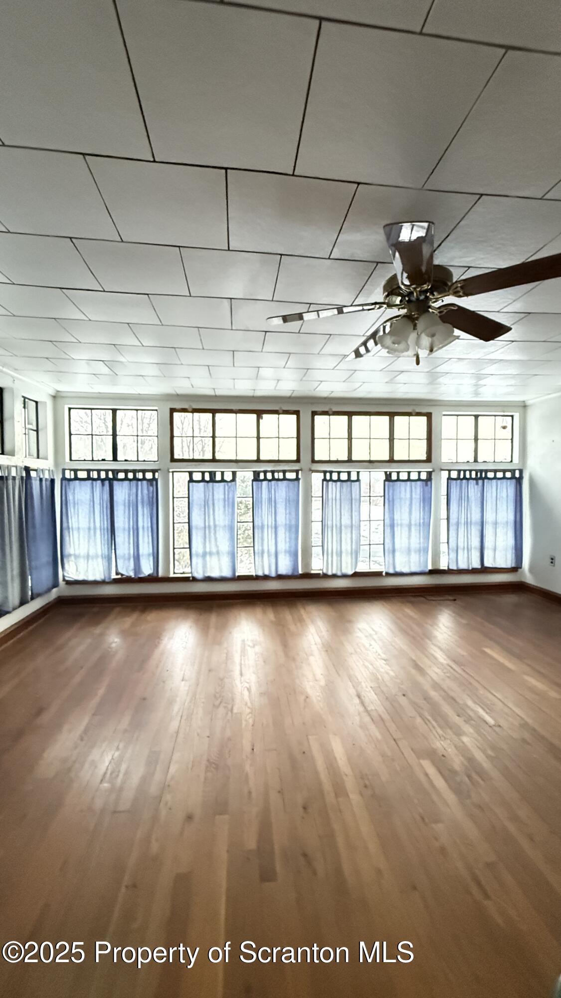 220 Hickory Ridge Road Carbondale, PA 18407 - Photo 31 of 51 a view of a room with wooden floor