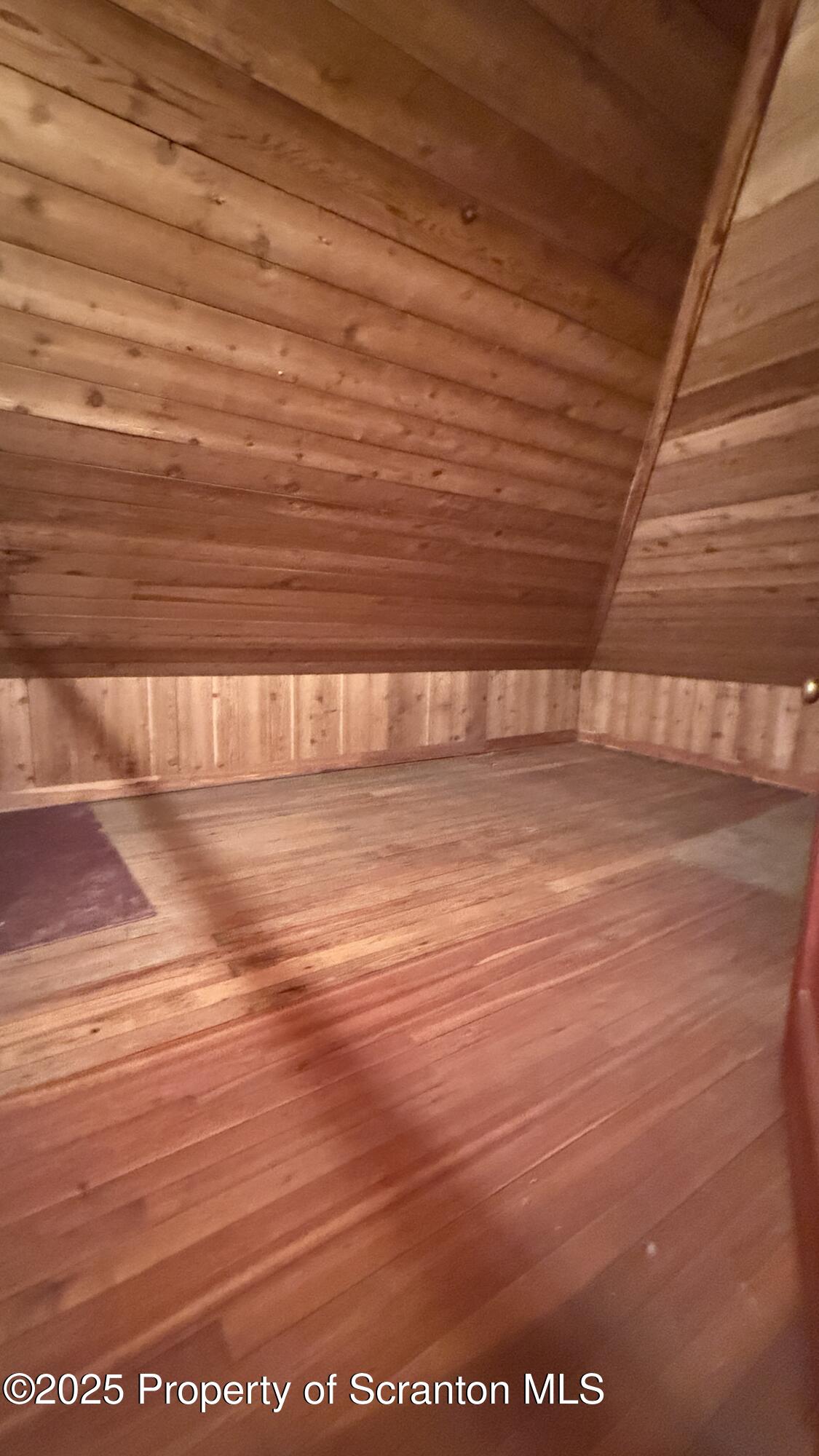 220 Hickory Ridge Road Carbondale, PA 18407 - Photo 44 of 51 a view of empty room with wooden floor