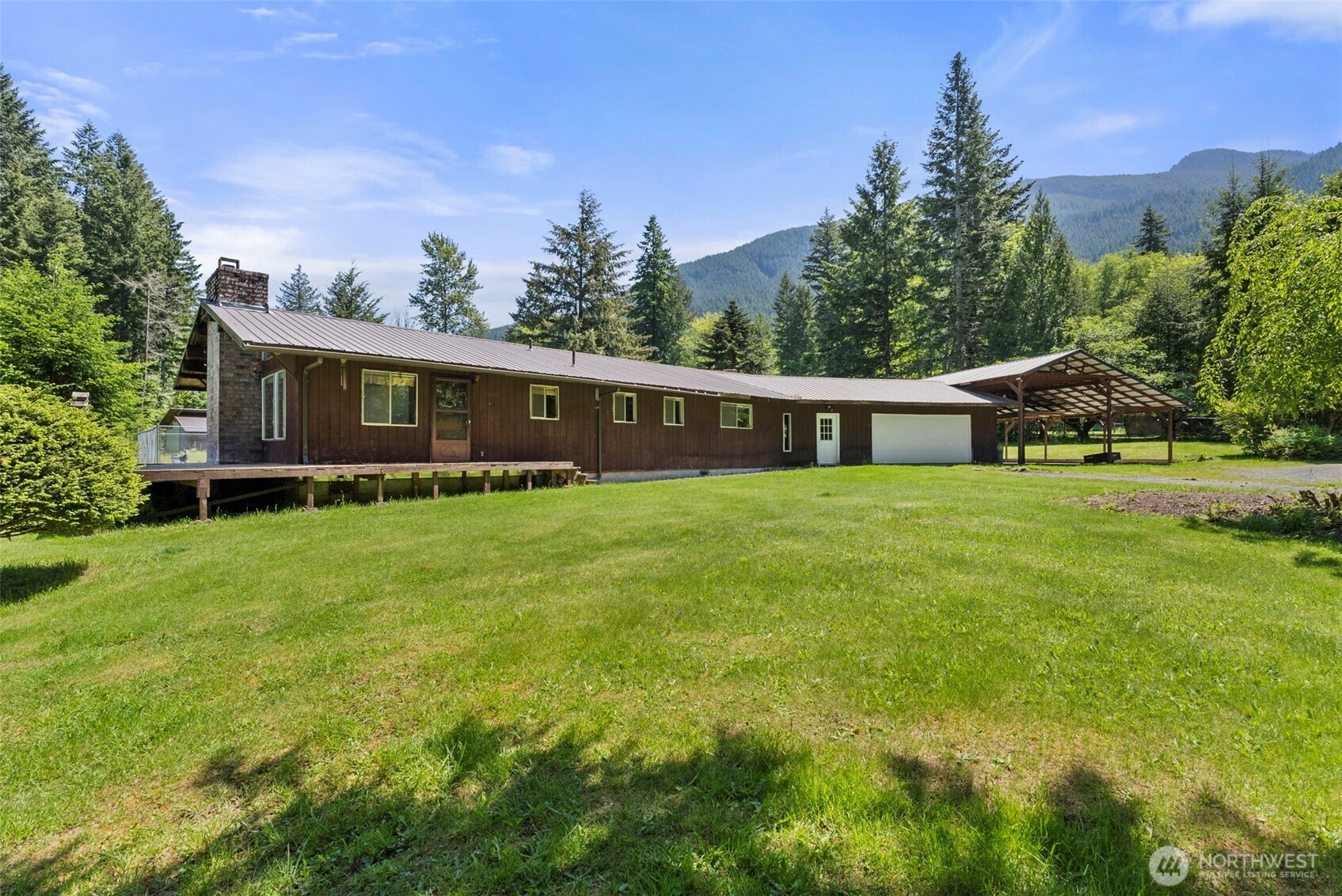 155 Bonell Road Randle, WA 98377 - Photo 1 of 38 a front view of house with yard and green space