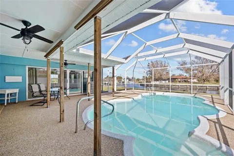 a house view with a sitting space and garden