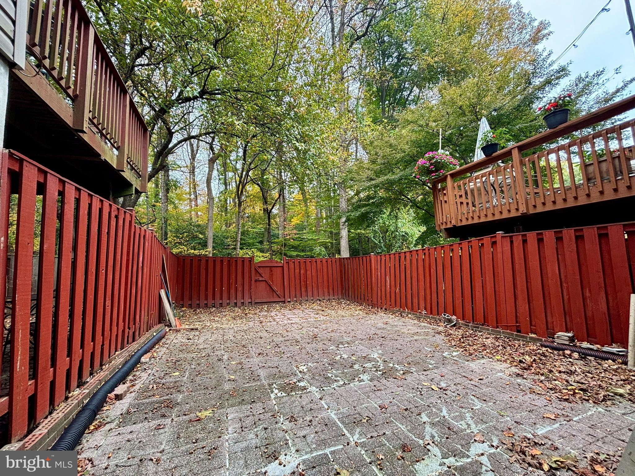 9004 Mulvaney Court Springfield, VA 22152 - Photo 23 of 23 a view of deck with wooden fence and trees