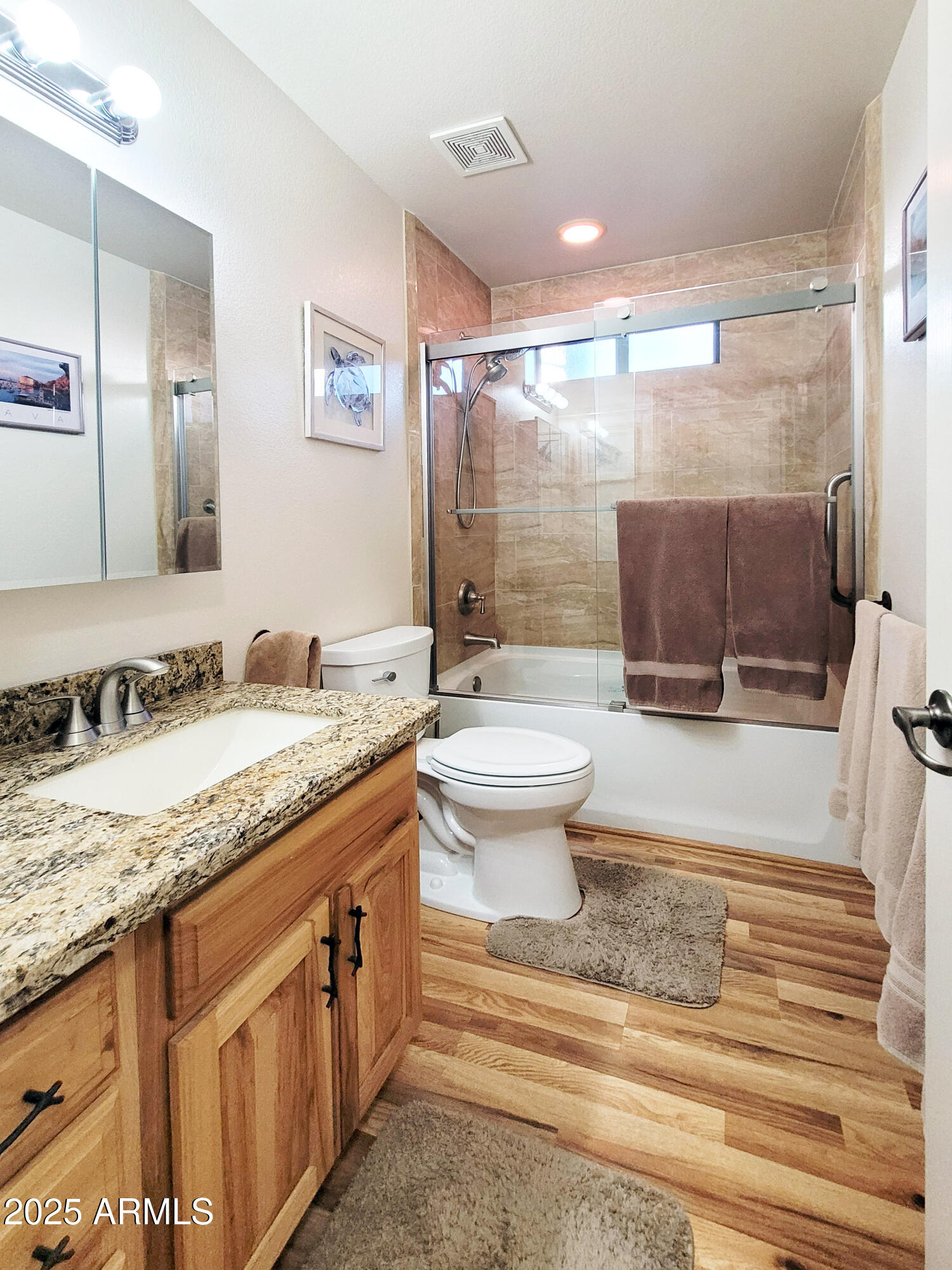 5579 Solitude Trail Loop Pine, AZ 85544 - Photo 35 of 50 a bathroom with a granite countertop sink toilet and shower