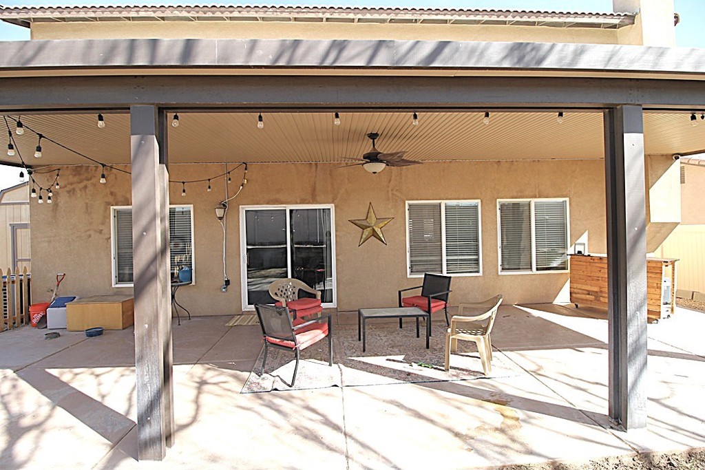 924 Condor Street Barstow, CA 92311 - Photo 47 of 52 a building outdoor space with patio furniture and potted plants