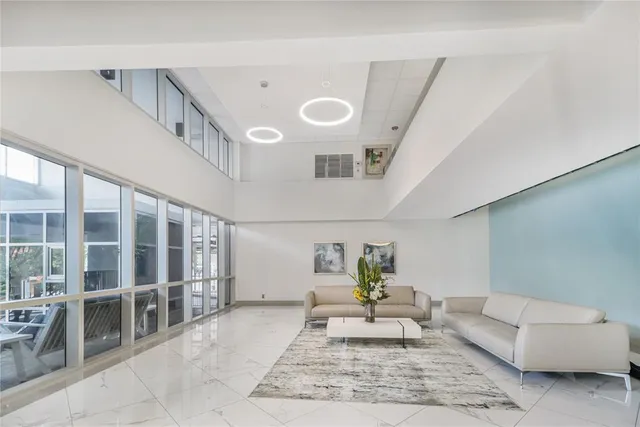 a bedroom with a bed and a dresser in it