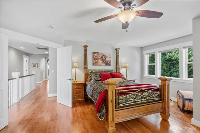 a bedroom with furniture and a window