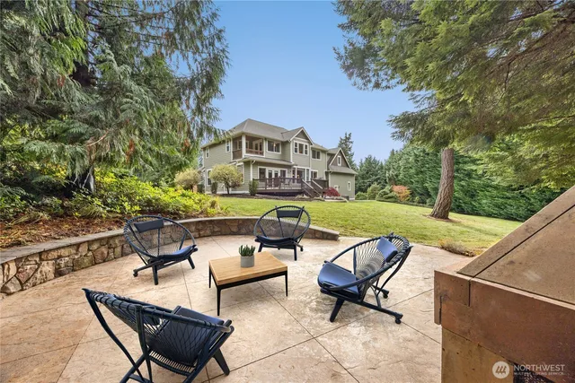 a view of a terrace with sitting area