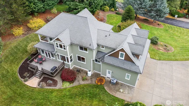 an aerial view of a house with garden