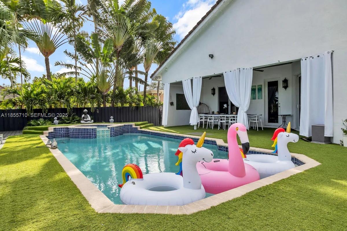 205 North 31st Avenue, Unit 1 Hollywood, FL 33021 - Photo 17 of 42 swimming pool view with seating space