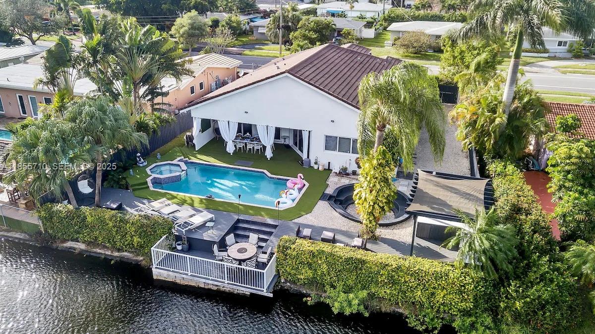 205 North 31st Avenue, Unit 1 Hollywood, FL 33021 - Photo 21 of 42 an aerial view of a house with swimming pool patio and outdoor seating