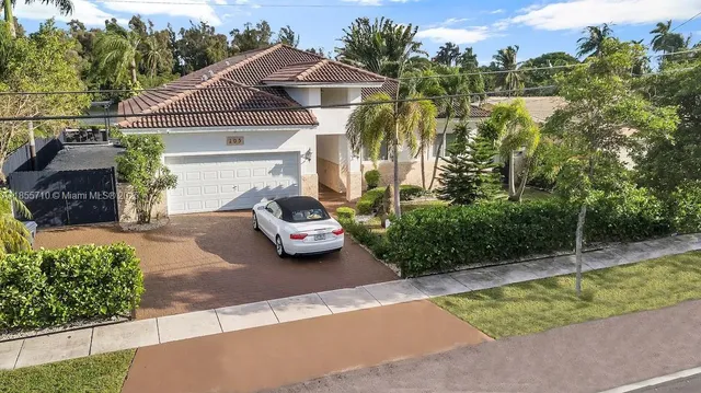 a bathroom with a sink a mirror and a bathtub