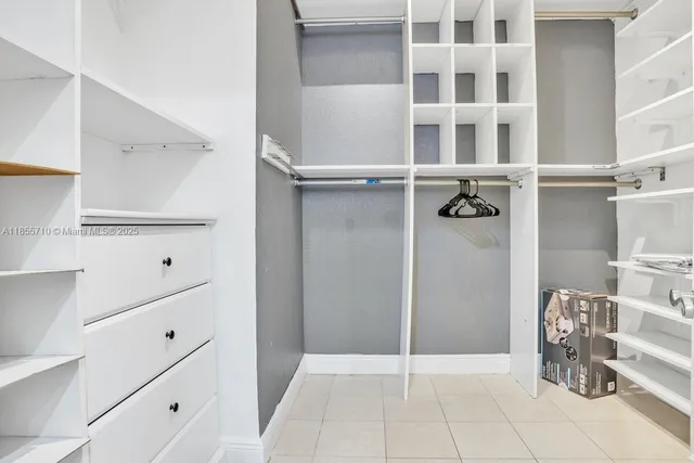 a view of swimming pool with a patio