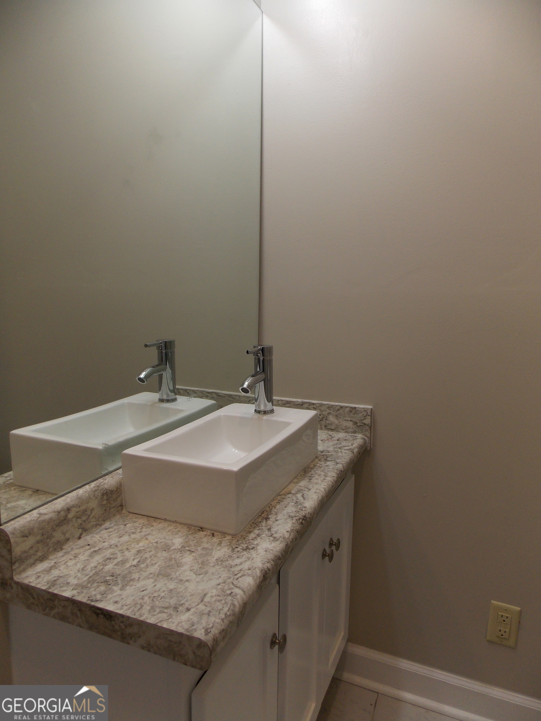 224 Pretoria Rushing Road Statesboro, GA 30461 - Photo 7 of 11 a bathroom with a granite countertop sink and vanity