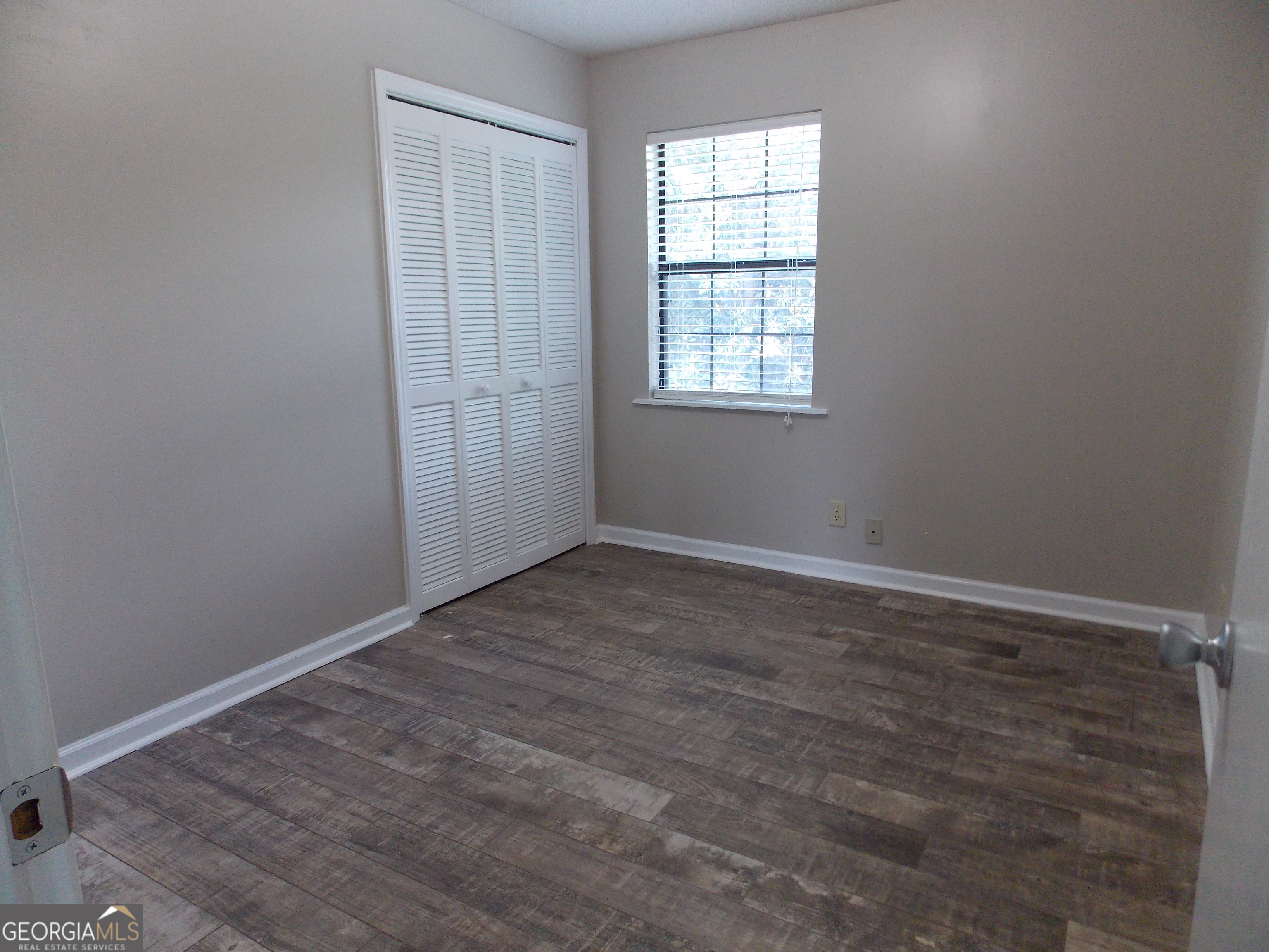 224 Pretoria Rushing Road Statesboro, GA 30461 - Photo 8 of 11 an empty room with windows