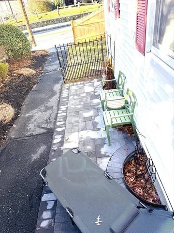 a view of a porch with furniture