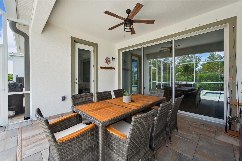 5961 Blakeney Loop Apollo Beach, FL 33572 - Photo 16 of 42 a table and chairs in front of window