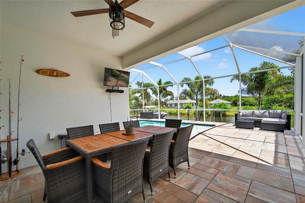 5961 Blakeney Loop Apollo Beach, FL 33572 - Photo 17 of 42 a view of a dining room with furniture window and outside view