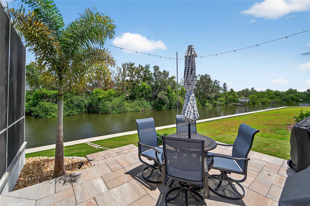 5961 Blakeney Loop Apollo Beach, FL 33572 - Photo 18 of 42 a view of a lake with furniture