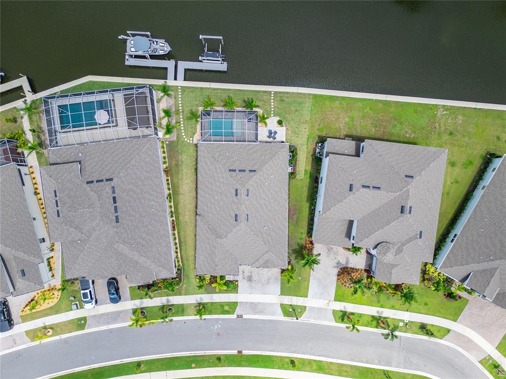 5961 Blakeney Loop Apollo Beach, FL 33572 - Photo 40 of 42 an aerial view of a house with a swimming pool